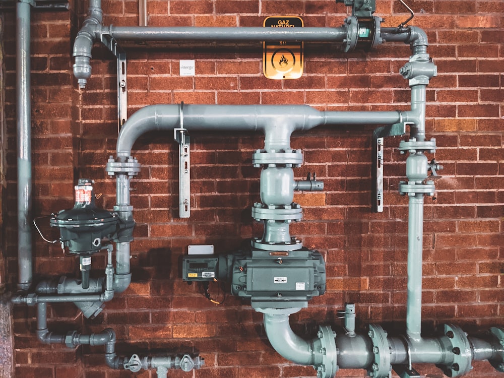 Professional plumber at work — the type of service business Virellus is built for